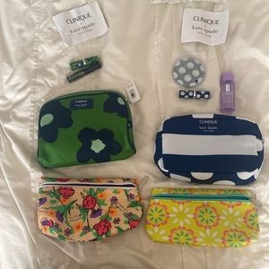4 pack Clinique, Kate Spade, Donald Robertson cosmetic bags with compact